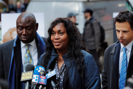 Tamara Lanier speaks to the media about a lawsuit accusing Harvard University of the monetization of photographic images of her great-great-great grandfather, an enslaved African man named Renty, and his daughter Delia, outside of the Harvard Club in New York, U.S., March 20, 2019. REUTERS/Lucas Jackson