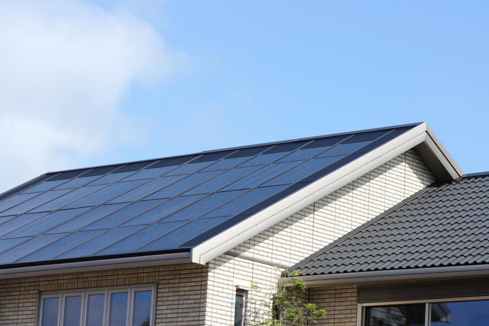 Home with large solar installation on the roof.