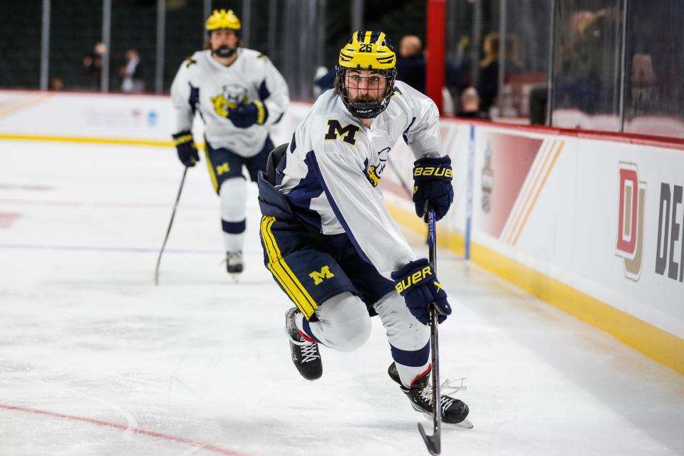 Michigan defenseman Seamus Casey (26) practice as the Wolverines prepare for the semifinal game against Boston College at Xcel Energy Center in St. Paul, Minn. on Wednesday, April 10, 2024.