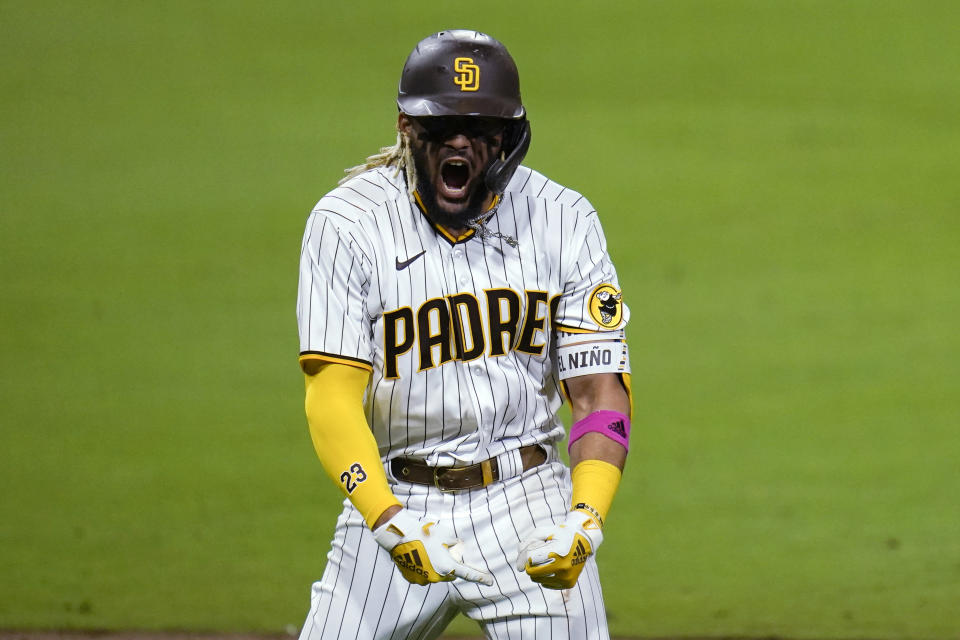 San Diego Padres' Fernando Tatis Jr. reacts after hitting a three-run home run during the sixth inning of Game 2 of the team's National League wild-card baseball series against the St. Louis Cardinals, Thursday, Oct. 1, 2020, in San Diego. (AP Photo/Gregory Bull)