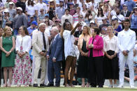 Venus Williams takes a photo standing between U.S. tennis legend Billie Jean King and Rod Laver during a 100 years of Centre Court celebration on day seven of the Wimbledon tennis championships in London, Sunday, July 3, 2022. (AP Photo/Kirsty Wigglesworth)