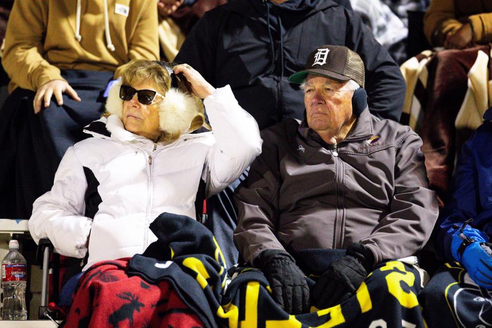 Attendees bundle up in the cold weather for Weber High School verses Davis High School in the second round of the Class 6A state tournament for high school football at Davis High School in Kaysville on Friday, Oct. 27, 2023. | Megan Nielsen, Deseret News