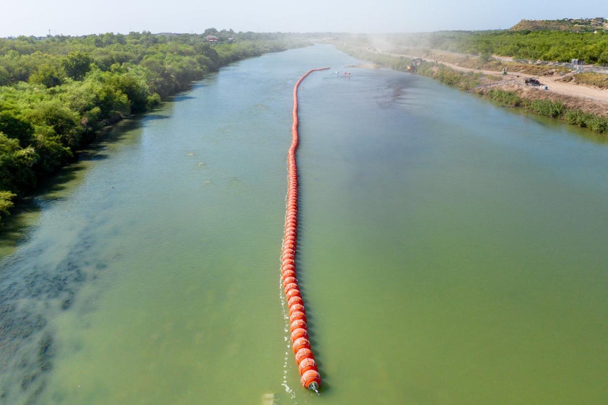 Buoy barriers are shown in the middle of the Rio Grande in Eagle Pass, Texas, on July 18, 2023. <a href="https://www.gettyimages.com/detail/news-photo/buoy-barriers-are-installed-and-situated-in-the-middle-of-news-photo/1554459107?adppopup=true" rel="nofollow noopener" target="_blank" data-ylk="slk:Brandon Bell/Getty Images;elm:context_link;itc:0;sec:content-canvas" class="link ">Brandon Bell/Getty Images </a>