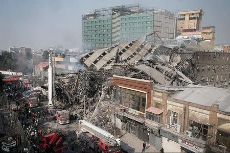 A collapsed building is seen in Tehran, Iran. Tasnim News Agency/Handout via REUTERS