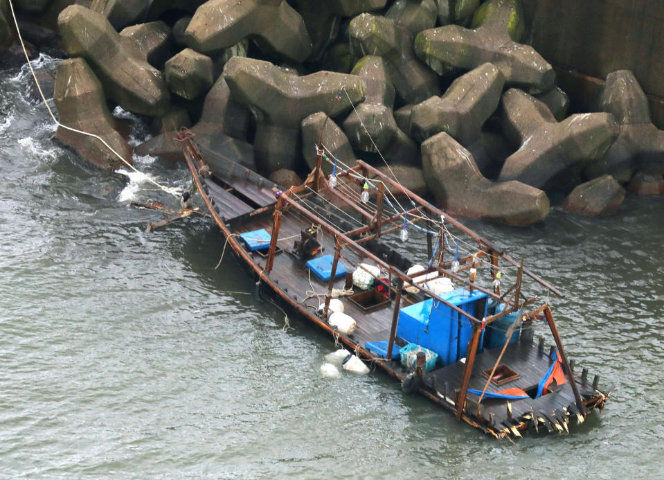 A wooden boat is moored at a nearby marina, in Yurihonjo, Akita prefecture, northern Japan (AP Images)