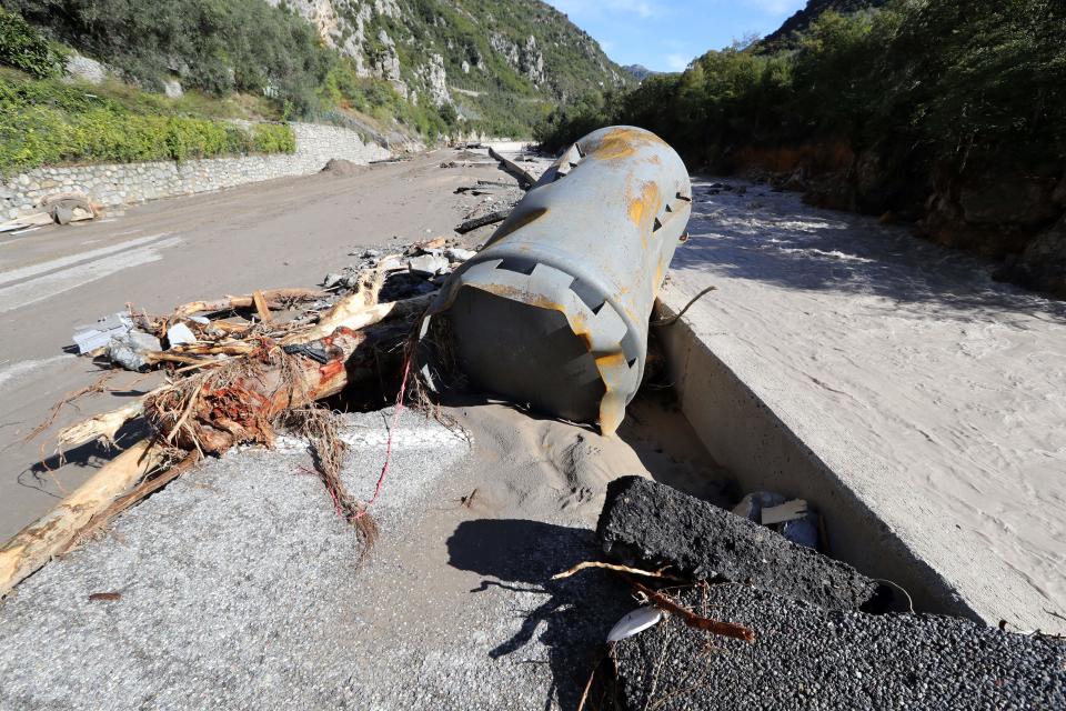 The River Roya flows past debris after the heavy floods and rain.