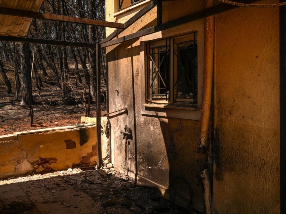 A house in Eleni Haniosakis following a wildfire in the village of Krioneri, north of Athens, in August (AFP via Getty Images)