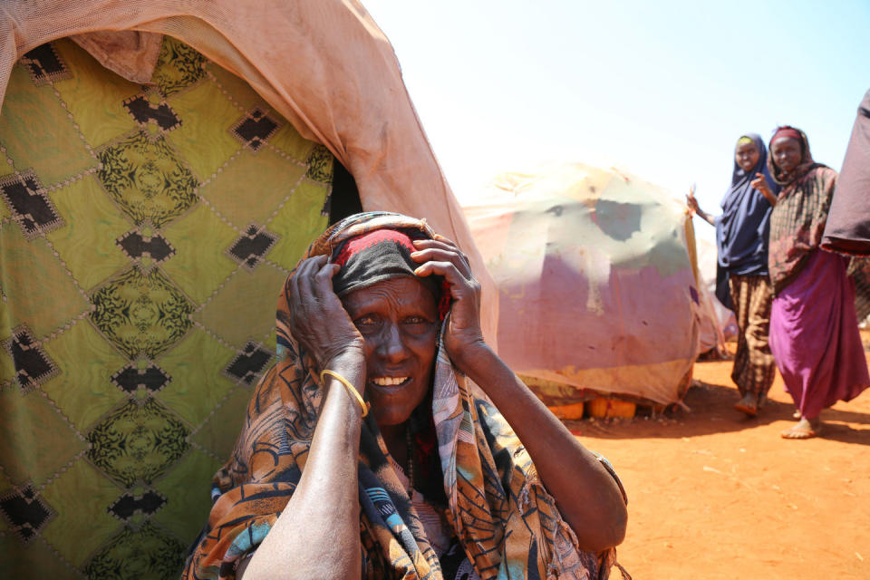 Women and children who build these makeshift houses often spend their days staring blankly at the world around them. Humanitarians have begun calling them "drought dropouts."