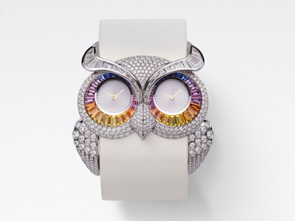 Owl timepiece in ethical 18-carat white gold, set with brilliant-cut and trapeze-cut diamonds as well as trapeze-cut multicoloured sapphires 