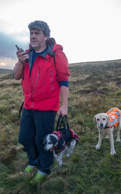 A harness was used to carry the tired dog back to safety - Credit: Keswick Mountain Rescue Team