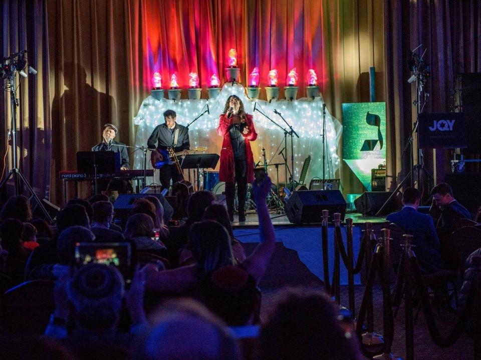 Singer Neshama Carlebach performs at a Hanukkah concert.