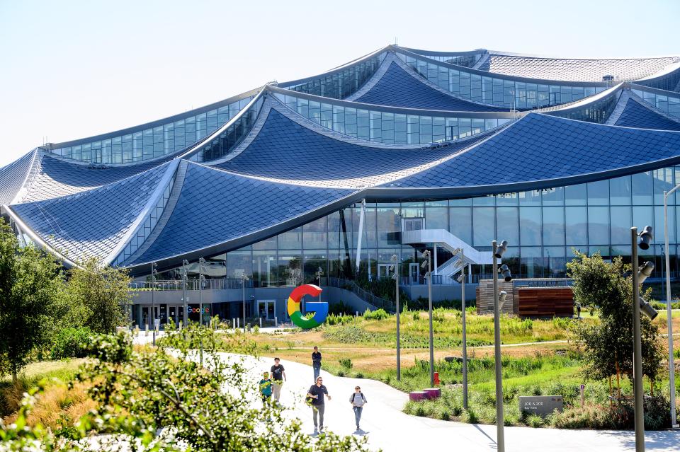 Workers leave Google's Bay View campus in Mountain View, California on June 27, 2022.