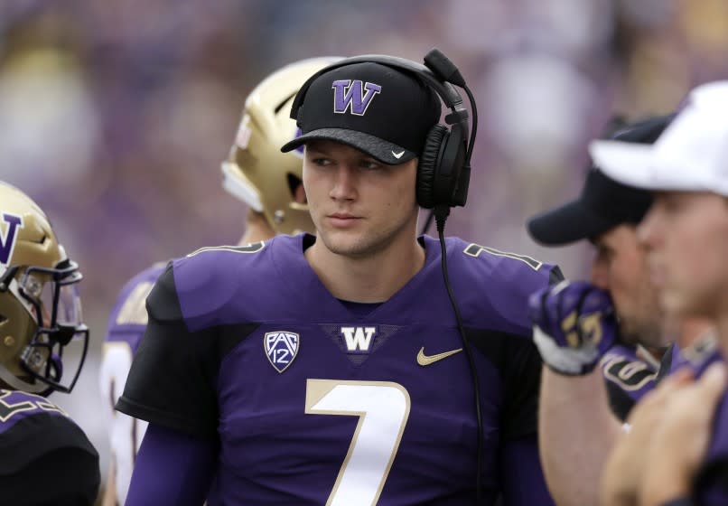Washington quarterback Colson Yankoff stands on the sidelines against North Dakota in an NCAA college football game Saturday, Sept. 8, 2018, in Seattle. (AP Photo/Elaine Thompson)