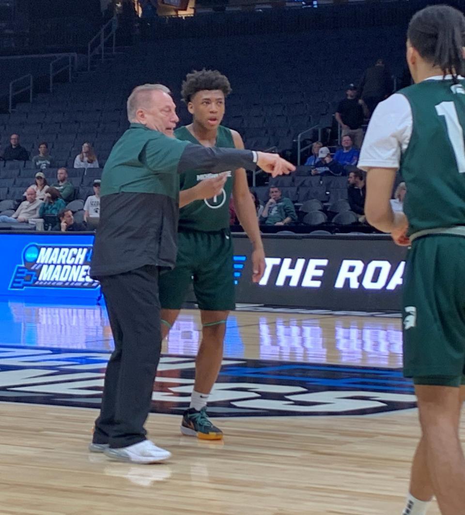 Jeremy Fears and Tom Izzo talk during Michigan State basketball's open practice Wednesday, March 20, 2024, at Spectrum Center in Charlotte, N.C. The Spartans face Mississippi State in the NCAA tournament, but Fears remains out after being shot in December 2023.