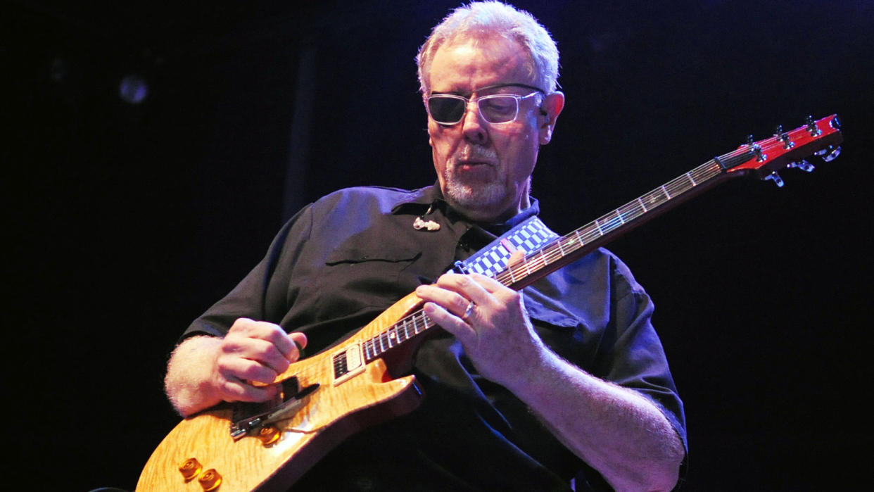  Rich Williams of Kansas performs at Chastain Park Amphitheater on August 14, 2013 in Atlanta, Georgia. 