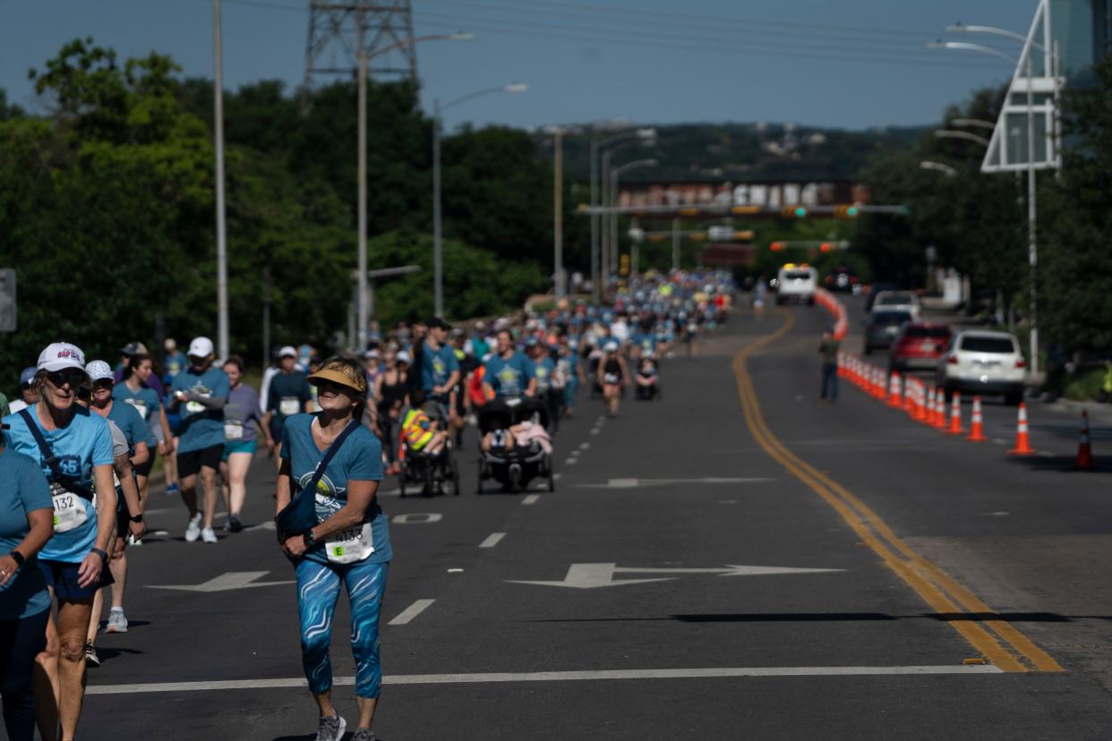 Runners fill César Chávez Street during the Statesman Cap 10K on April 16, 2023.