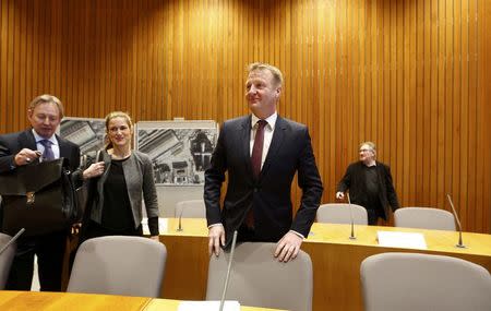 North Rhine Westphalia state Interior Minister Ralf Jaeger (C) arrives for an internal commitee meeting of North-Rhine Westphalia state parliament in Duesseldorf, Germany January 11, 2016. REUTERS/Ina Fassbender