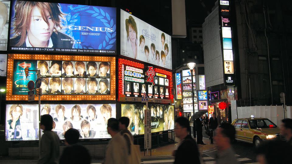 Advert boards of host clubs are illuminated at the Kabukicho entertainment area on November 5, 2007 in Tokyo, Japan. - The Asahi Shimbun/Getty Images