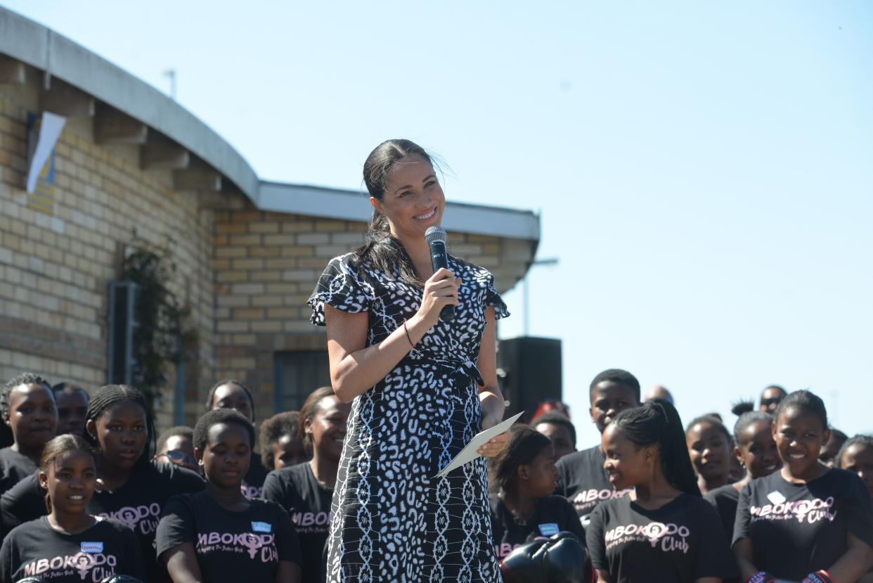 Meghan, Duchess of Sussex delivers a speech during a visit with the Duke of Sussex to the "Justice desk", an NGO in the township of Nyanga in Cape Town, as they begin their tour of the region on September 23, 2019. - Britain's Prince Harry and his wife Meghan arrived in South Africa on September 23, launching their first official family visit in the coastal city of Cape Town. The 10-day trip began with an education workshop in Nyanga, a township crippled by gang violence and crime that sits on the outskirts of the city. (Photo by Courtney AFRICA / POOL / AFP)        (Photo credit should read COURTNEY AFRICA/AFP via Getty Images)