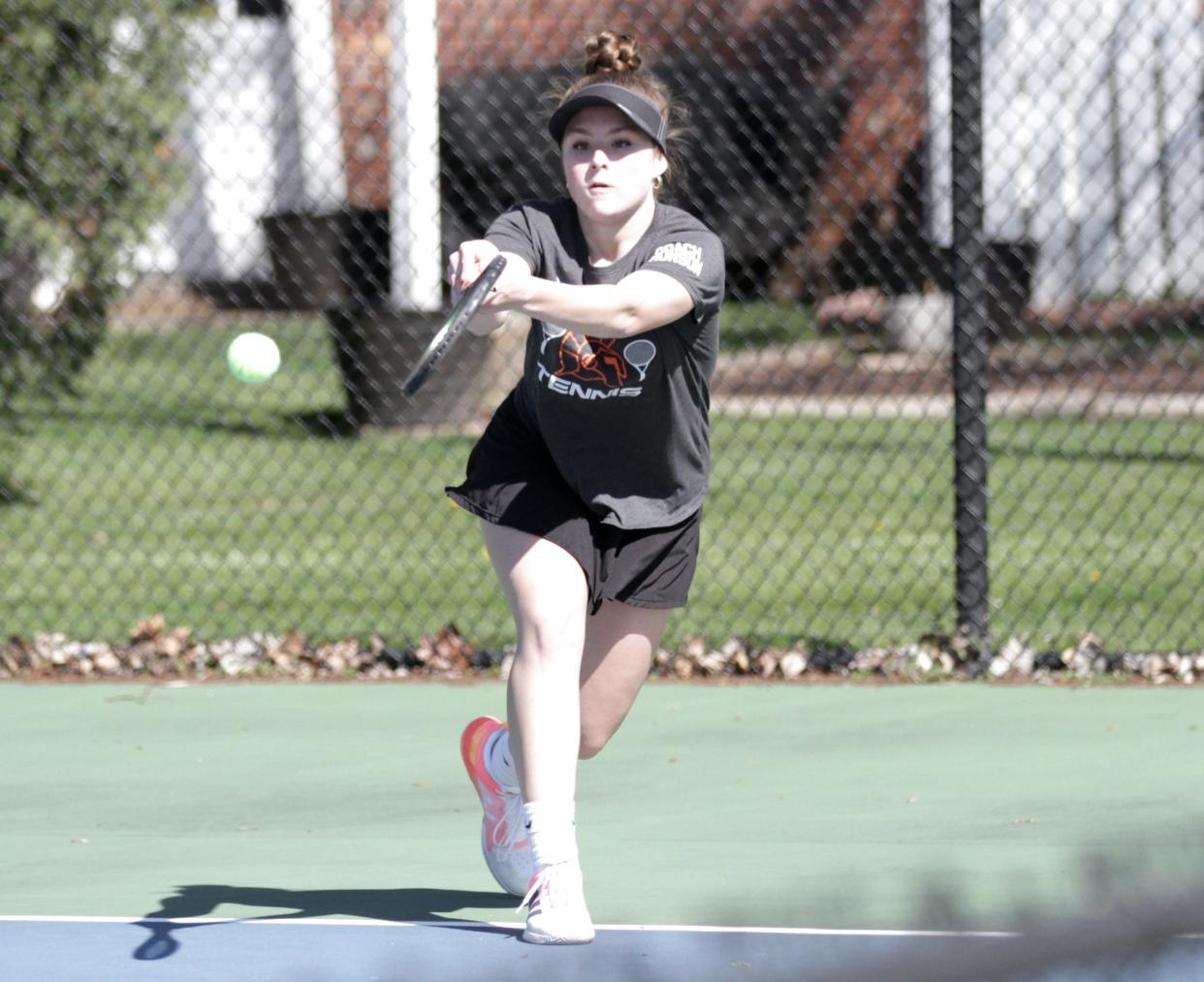 Gracie Perry of Sturgis hits a return in one of her matches this season.