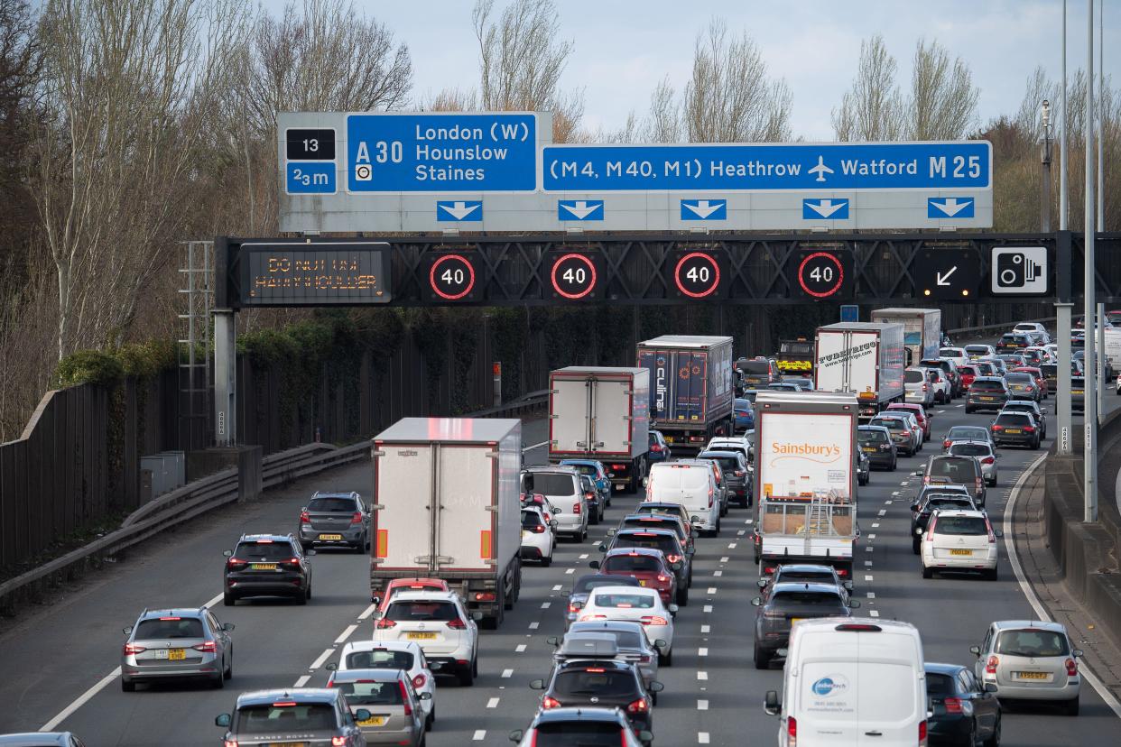 Egham, Surrey, UK. 25th March, 2023. The M25 at Egham, Surrey. There were long tailbacks of up to ten miles on the M25 today due to emergency repairs on a section of the road. Two lanes of the M25 remain closed between J13 A30 (Staines) and J14 A3113 Airport Way (Heathrow). Lanes four and five of the clockwise carriageway will remain closed throughout the day. There was also an accident between Junction 11 (Chertsey) and J10 (A3 and  Guildford) due to a multi vehicle collision. Credit: Maureen McLean/Alamy Live News