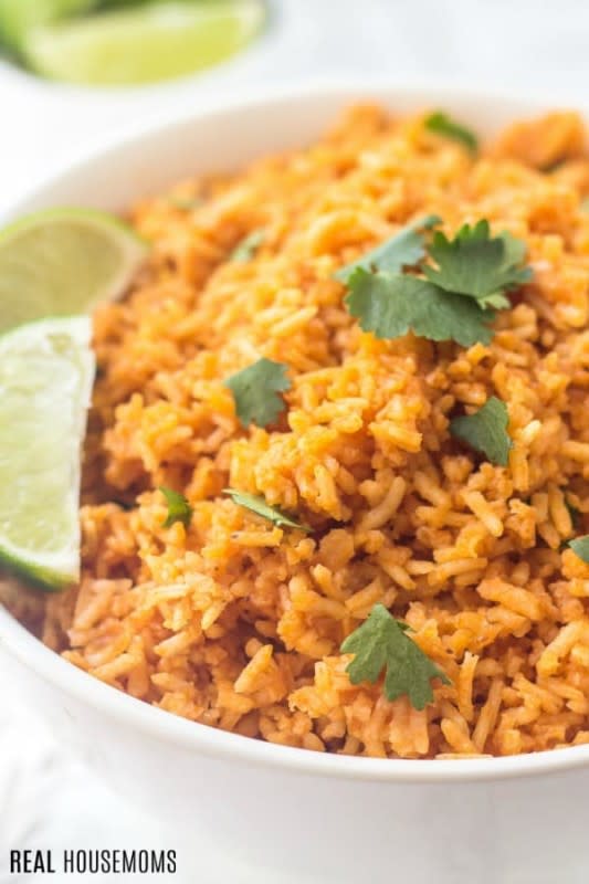 <p>Real Housemoms</p><p>Make this restaurant favorite at home. Get this <a href="https://realhousemoms.com/mexican-rice-recipe/" rel="nofollow noopener" target="_blank" data-ylk="slk:Mexican Rice;elm:context_link;itc:0;sec:content-canvas" class="link rapid-noclick-resp">Mexican Rice</a> recipe!</p><p><strong>Related: <a href="https://parade.com/1013599/kristamarshall/easy-crock-pot-recipes-for-cinco-de-mayo/" rel="nofollow noopener" target="_blank" data-ylk="slk:42 Best Mexican Crock Pot Recipes & Casseroles;elm:context_link;itc:0;sec:content-canvas" class="link rapid-noclick-resp">42 Best Mexican Crock Pot Recipes & Casseroles</a></strong></p>
