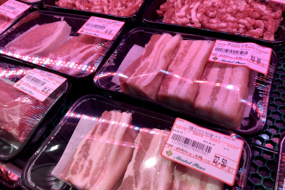 Packs of Canadian pork are displayed for sale at a supermarket in Beijing, Tuesday, June 18, 2019. China will halt imports from a Canadian company after food safety issues were detected in one batch of pork, the Xinhua state news agency reported Tuesday, a move likely to fuel further speculation that China is retaliating against Canada after it arrested a Chinese tech executive. (AP Photo/Andy Wong)