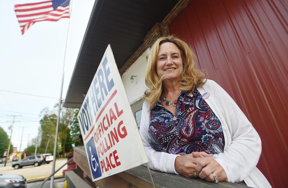 Waterford Township resident Kellie Lichtinger, 50, leaves Stancliff Hose Co. after voting during the municipal primary election in Waterford on Tuesday.