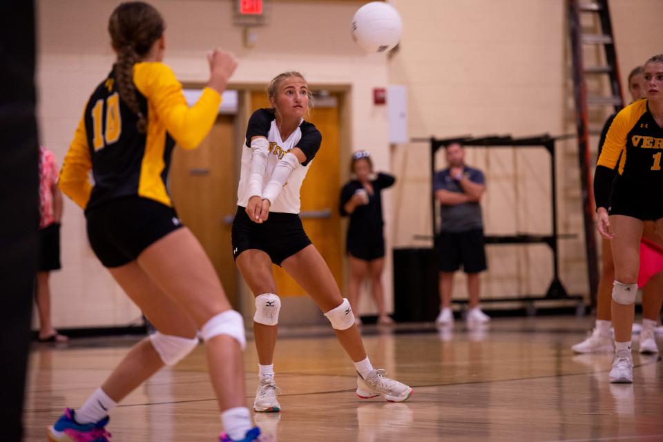 Bishop Verot hosted Estero in volleyball match on Tuesday, Sept. 5. Marissa Peck makes a dig. The Vikings won in three close sets on what was billed at Neon Night.