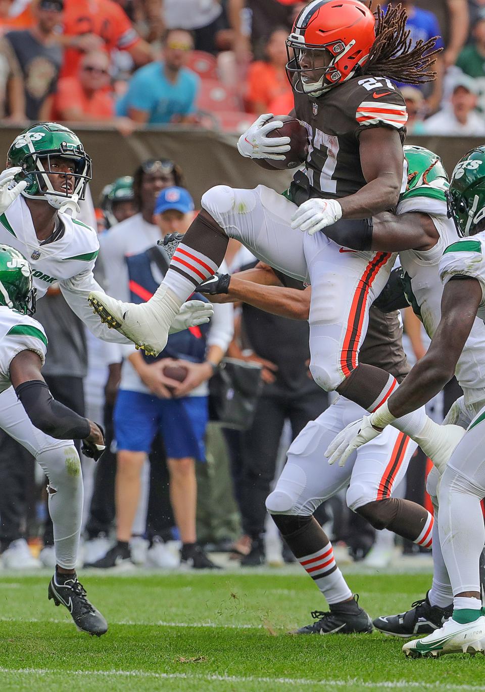 Browns running back Kareem Hunt leaps for extra yardage during a fourth-quarter run against the New York Jets on Sunday, Sept. 18, 2022 in Cleveland.
