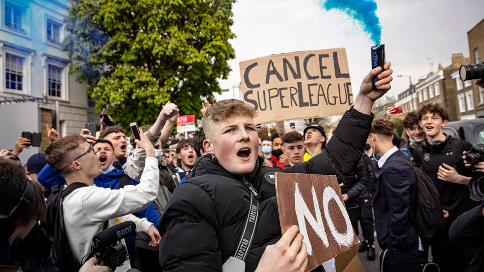 Pictured here, football fans in England protest the European Super League.