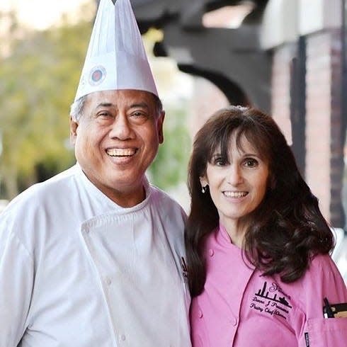 Yono Purnomo poses with his wife, Donna.