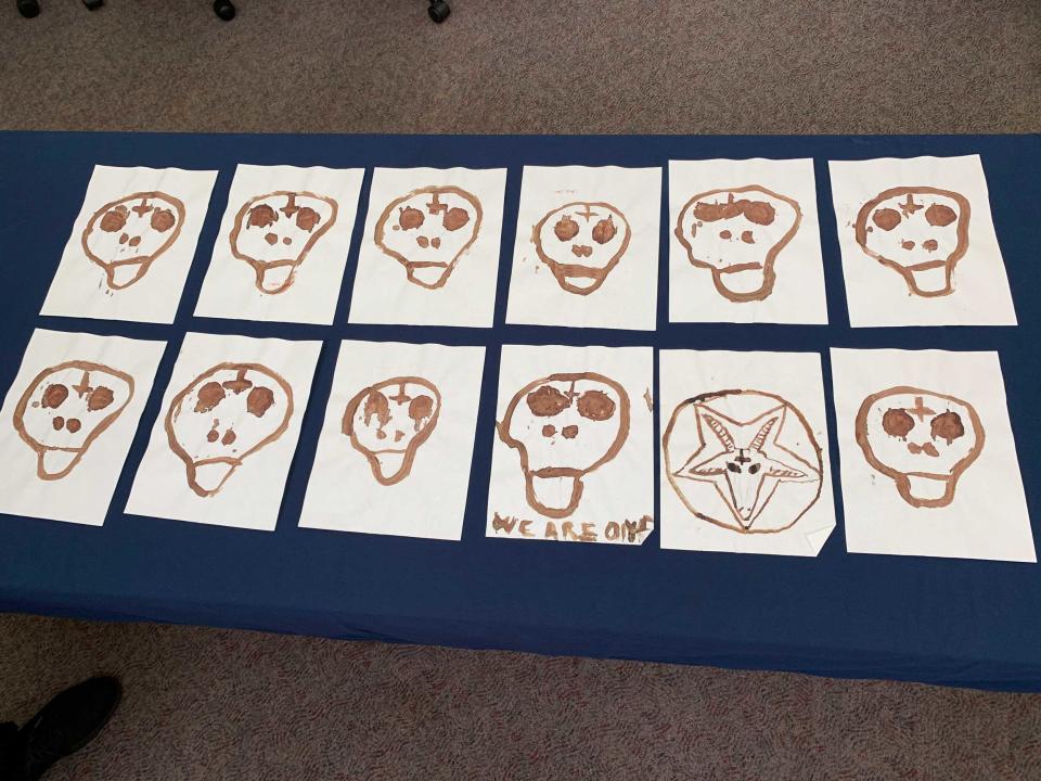 These skulls, drawn by serial killer Israel Keyes in his own blood, were found under his bed in his jail cell. The FBI is making them public for the first time. It is believed Keyes killed 11 people, as represented by the 11 skulls.  / Credit: FBI