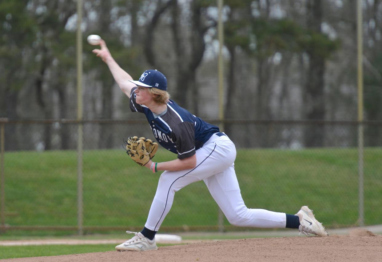 Monomoy's Chace Robbins pitches to a St. John Paul II play in first innng action.