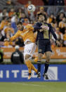 HOUSTON, TX - NOVEMBER 03: Brad Davis #11 of the Houston Dynamo heads the ball against Velijko Paunovic #16 of the Philadelphia Union in the second leg of the playoffs on November 3, 2011 at Robertson Stadium in Houston, Texas. The Dynamo won 1 to 0 and will play the Sporting K.C. Sunday, November 6, 2011. (Photo by Thomas B. Shea/Getty Images)