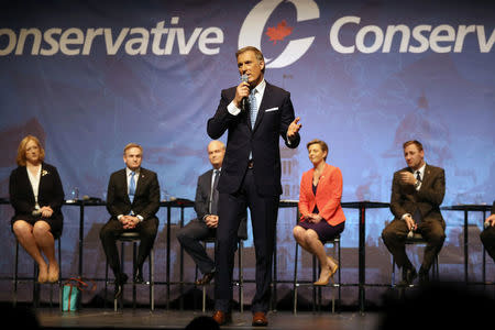 Conservative Party Leadership candidate Maxime Bernier, addresses crowd at the Conservative Party of Canada's final televised debate in Toronto, Ontario, April 26, 2017. REUTERS/Fred Thornhill