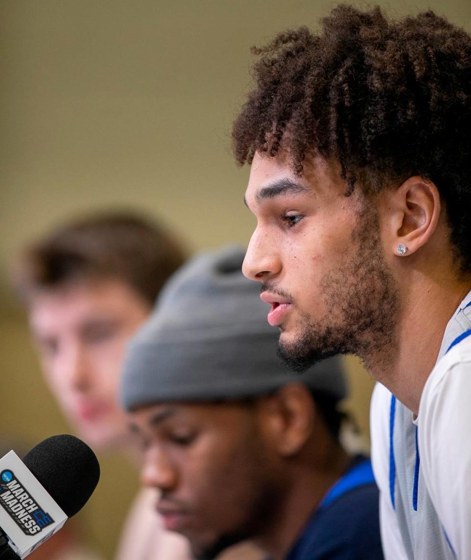 Duke’s Dereck Lively II (1) fields questions from the media with teammates Jeremy Roach (3) and Kyle Filipowski (30) on Wednesday, March 15, 2023 at the Amway Center in Orlando, Fla.