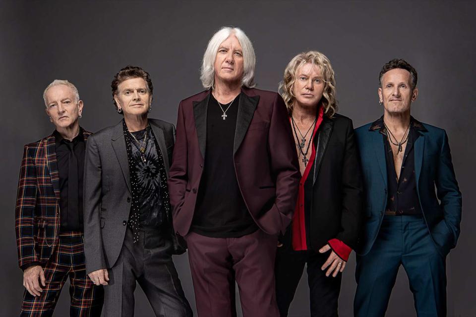 Def Leppard (L-R Phil Collen, Rick Allen, Joe Elliott, Rick Savage and Vivian Campbell) in 2022.