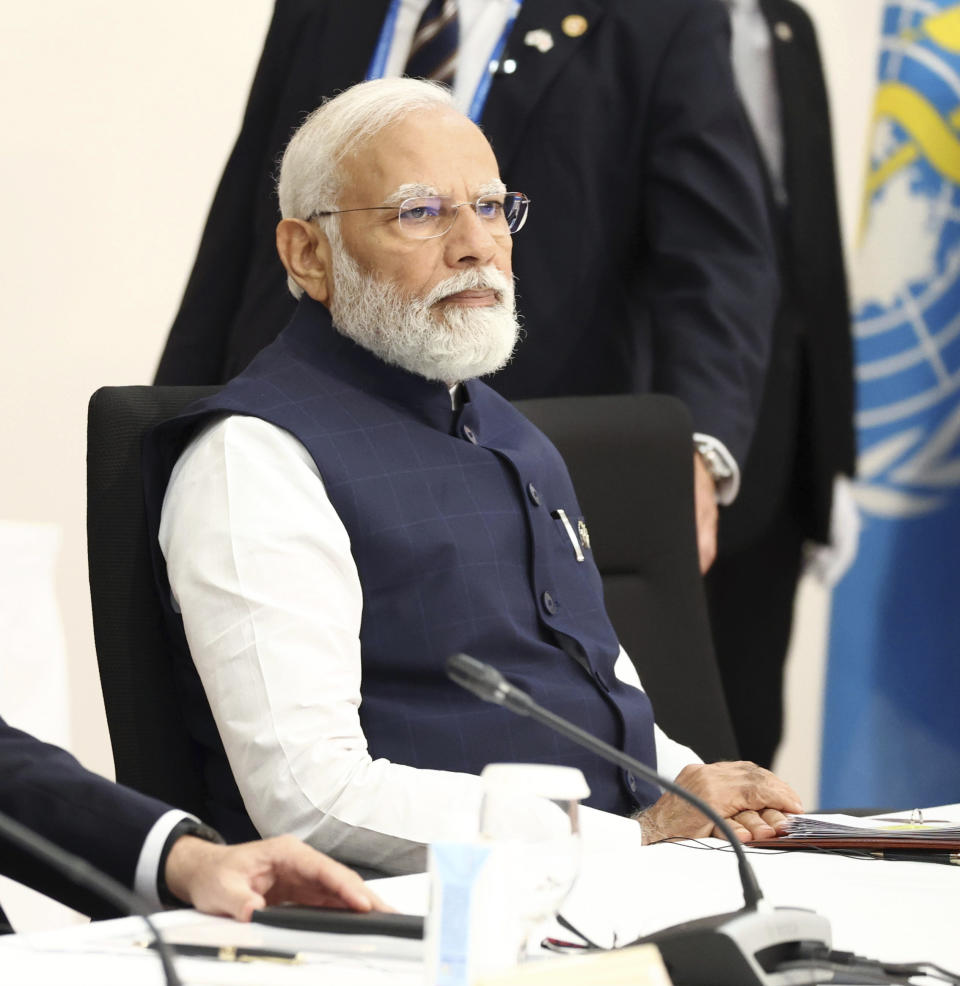 Indian Prime Minister Narendra Modi attends an outreach session of the leaders of the G7 nations and invited countries, during the G7 Summit in Hiroshima, western Japan, Saturday, May 20, 2023. (Japan Pool via AP)