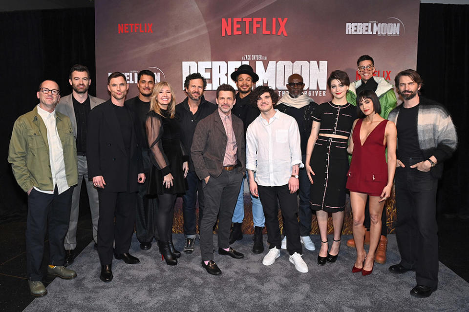 (L-R) Wesley Coller, Stuart Martin, Ed Skrein, Staz Nair, Deborah Snyder, Eric Newman, Zack Snyder, Ray Fisher, Fra Fee, Djimon Hounsou, Elise Duffy, Sofia Boutella and Michiel Huisman attend Netflix's Rebel Moon Part Two: The Scargiver New York Screening at AMC Lincoln Square Theater on April 05, 2024 in New York City.