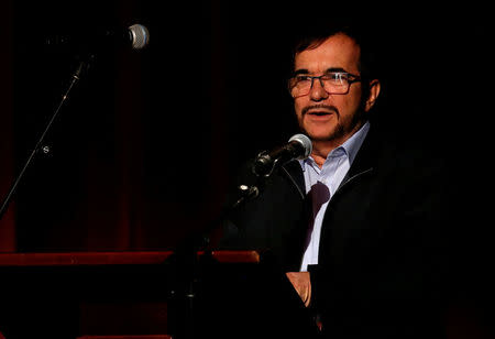 Colombia's Marxist FARC rebel leader Rodrigo Londono, known as Timochenko, speaks during celebrations of a year of peace signing in Bogota, Colombia November 24, 2017. REUTERS/Jaime Saldarriaga