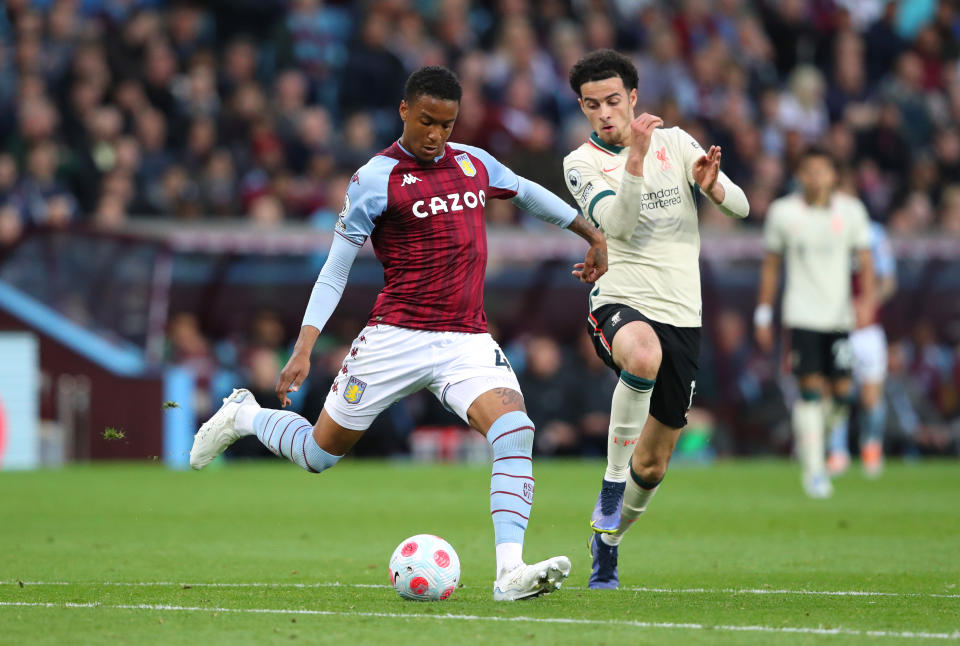 BIRMINGHAM, ENGLAND - MAY 10: Ezri Konsa of Aston Villa holds off a challenge from Curtis Jones of Liverpool during the Premier League match between Aston Villa and Liverpool at Villa Park on May 10, 2022 in Birmingham, England. (Photo by Alex Livesey - Danehouse/Getty Images)