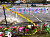 <p>A makeshift memorial is seen on a fence outside Marjory Stoneman Douglas High School , Feb. 19, 2018 in Parkland, Fla. (Photo: Mindy Katzman/Yahoo News) </p>