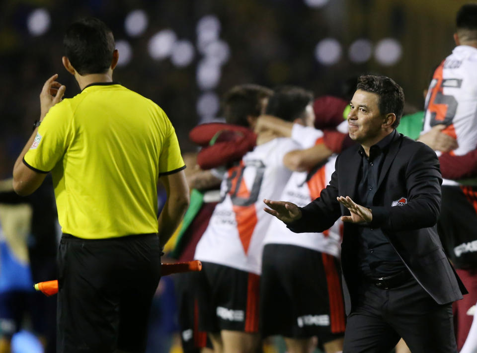 Manager Marcelo Gallardo (right) and River Plate beat Boca Juniors in a relatively tame Copa Libertadores encounter compared to last year's ugliness. (Reuters)