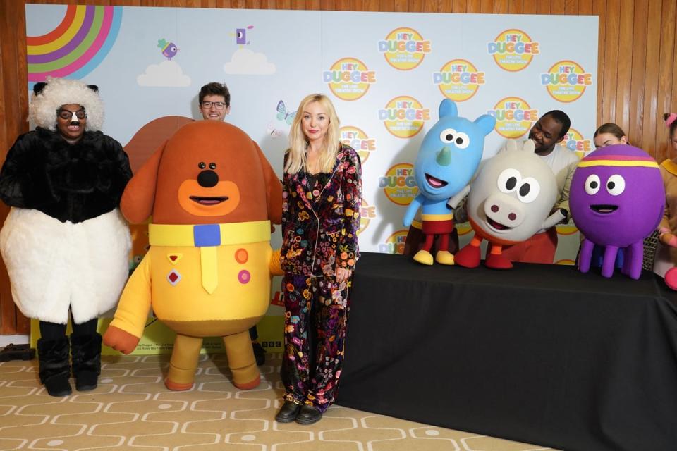 Helen George poses with the cast of Hey Duggee The Live Theatre Show (PA)