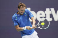 Daniil Medvedev, of Russia, returns a volley against Karen Khachanov, of Russia, in the first set of a match at the Miami Open tennis tournament, Friday, March 31, 2023, in Miami Gardens, Fla. (AP Photo/Jim Rassol)