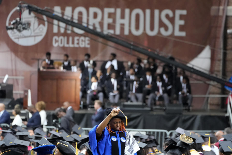 A participant stands with their back to President Joe Biden as Biden speaks to graduating students at Morehouse College on Sunday, May 19, 2024, in Atlanta.  (AP Photo/John Bazemore)