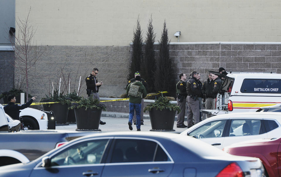 Emergency responders set up a command area outside Dillard's at Fashion Place mall after reports of a shooting in Murray, Utah, Sunday, Jan. 13, 2019. (Francisco Kjolseth/The Salt Lake Tribune via AP)