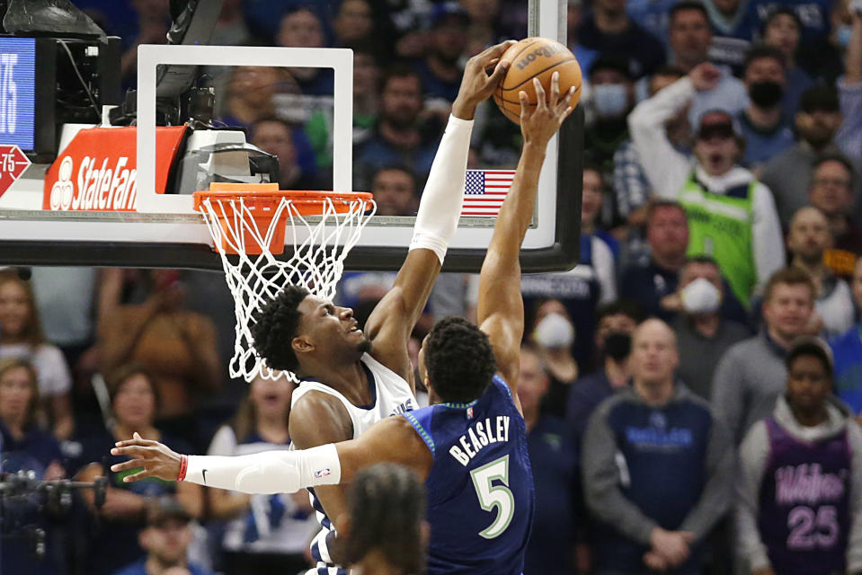 Minnesota Timberwolves guard Malik Beasley (5) has his dunk attempt blocked by Memphis Grizzlies forward Jaren Jackson Jr. during the first half of Game 3 of an NBA basketball first-round playoff series Thursday, April 21, 2022, in Minneapolis. (AP Photo/Andy Clayton-King)