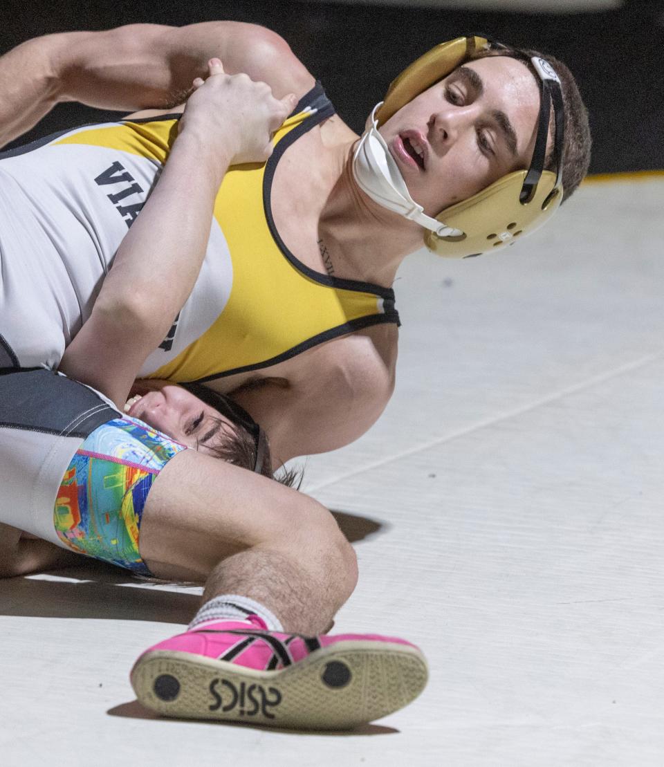 St. John Vianney's Anthony Knox (top) is the No. 1 seed at 121 pounds in the Escape The Rock Tournament.